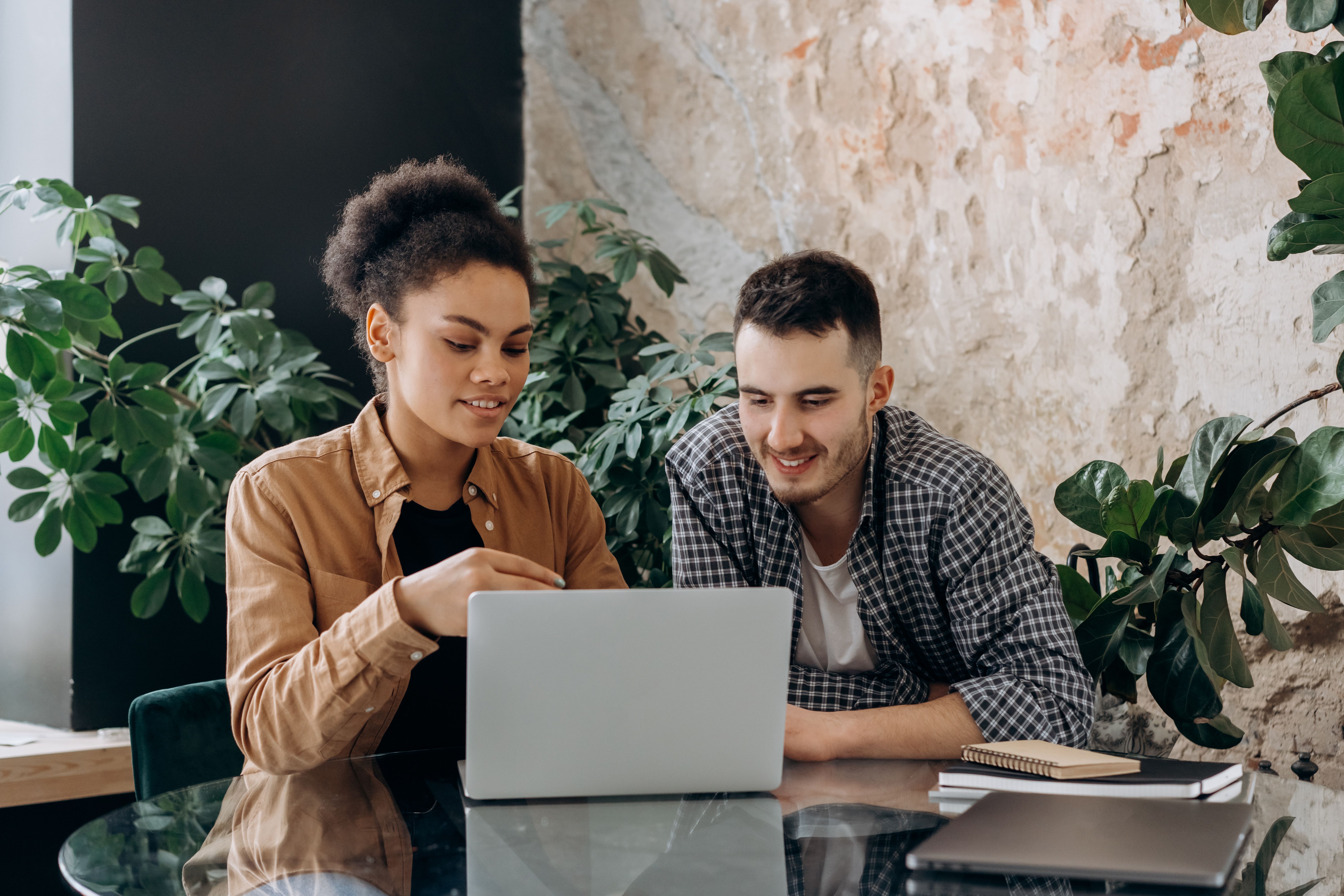 Two-people-working-laptop